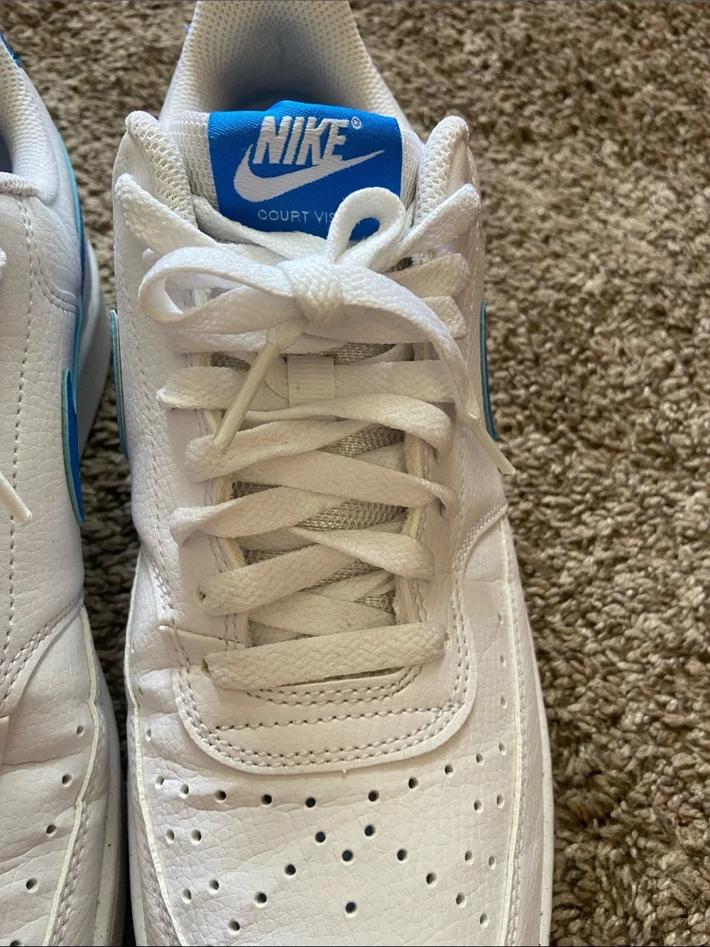 Nike White Low-Top Sneakers with Blue Swoosh